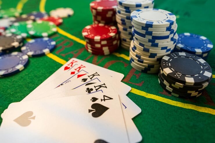 qqbet333 mobile app interface showing football markets and live-dealer tables